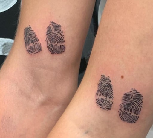 Fingerprints tattoo.