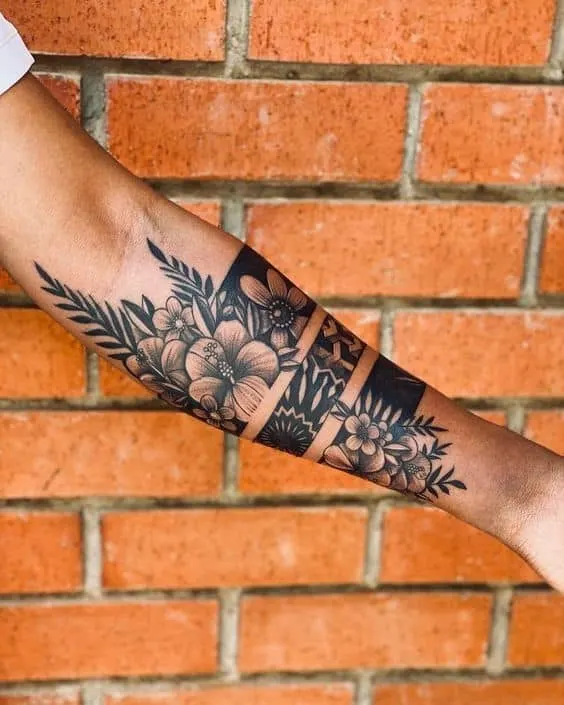 Floral tribal sleeve tattoo
