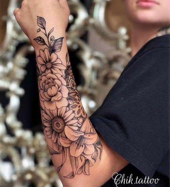 Forearm sunflower tattoo