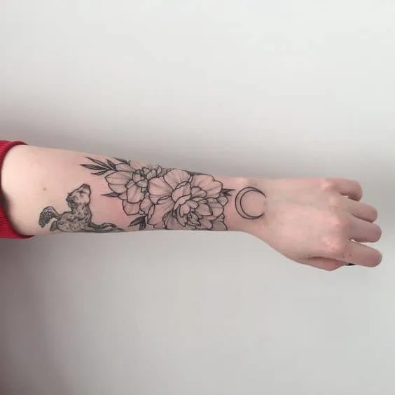 Minimal outer forearm tattoo