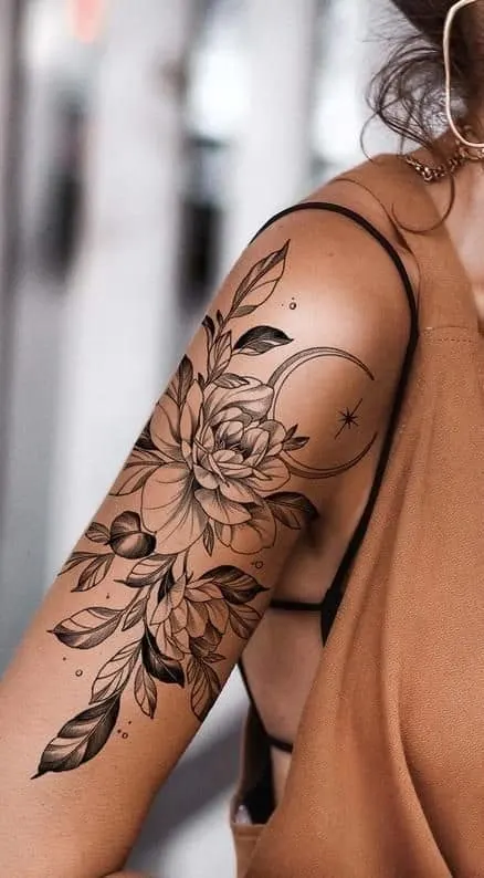 Moon and flowers arm sleeve on woman