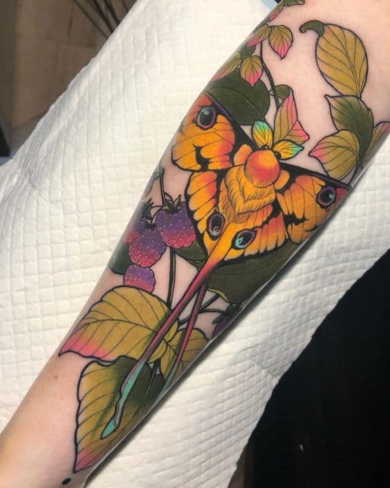 Moth forearm half-sleeve tattoo