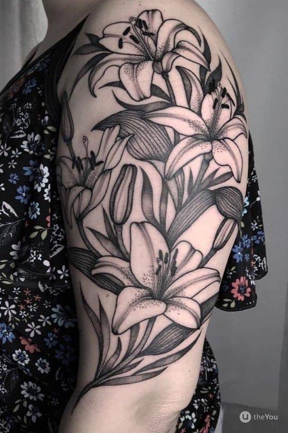 Tatuaggio a mezza manica con orchidee