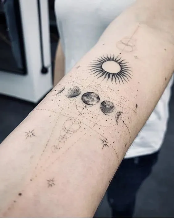 Sun and moon sleeve tattoo