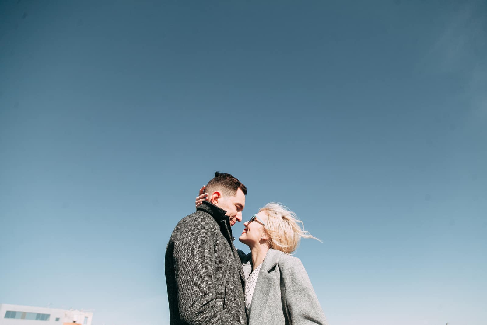 photo of a couple after a kiss