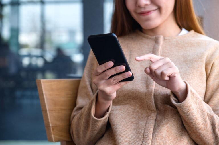 woman using her phone