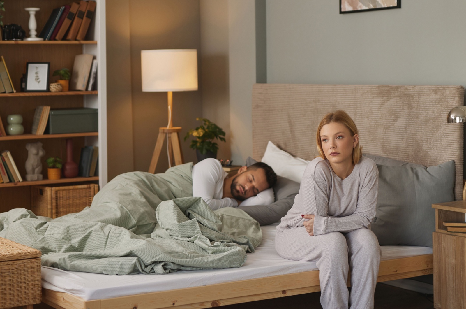 guy sleeping and woman sitting