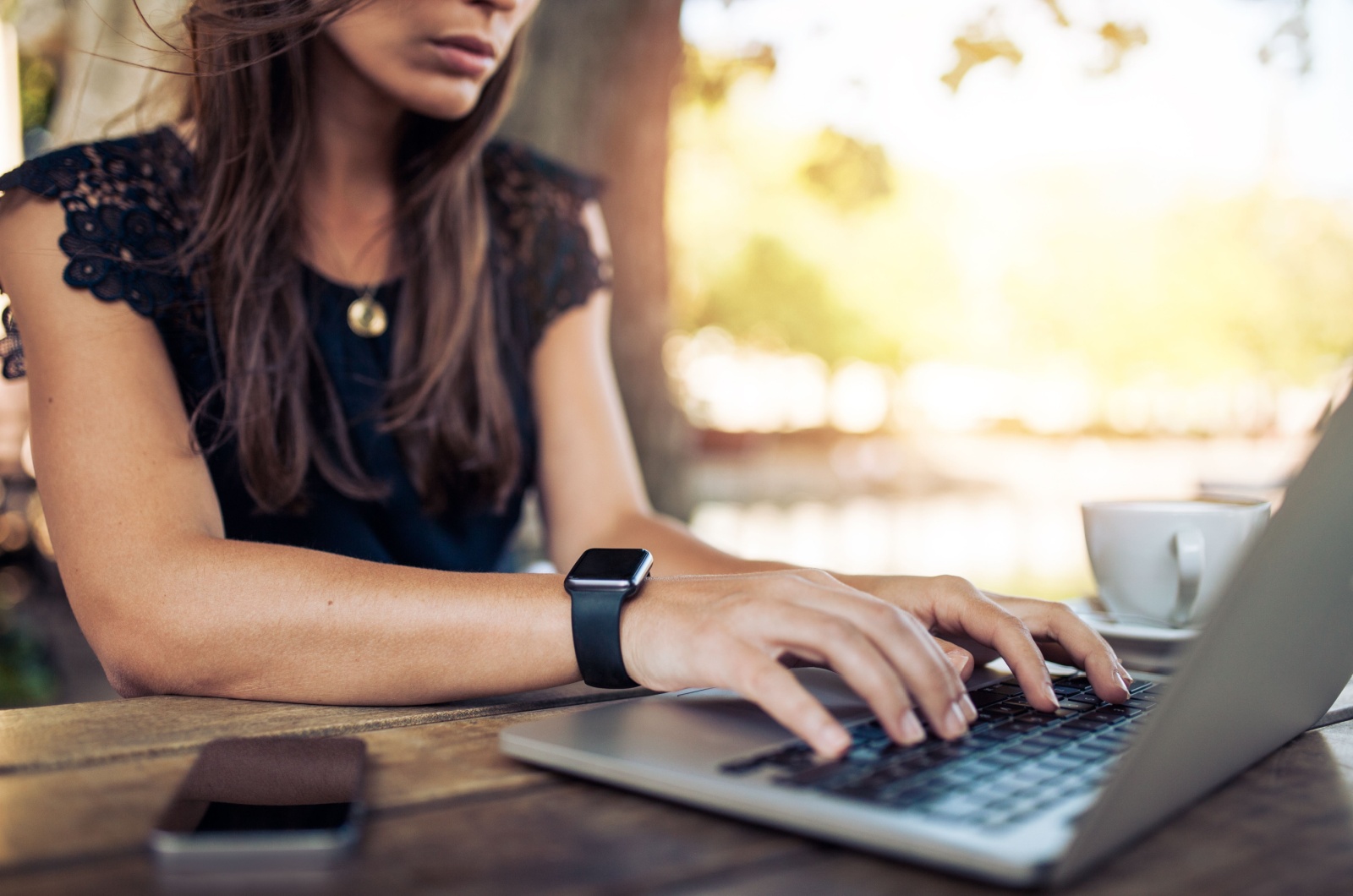 woman typing on laptop