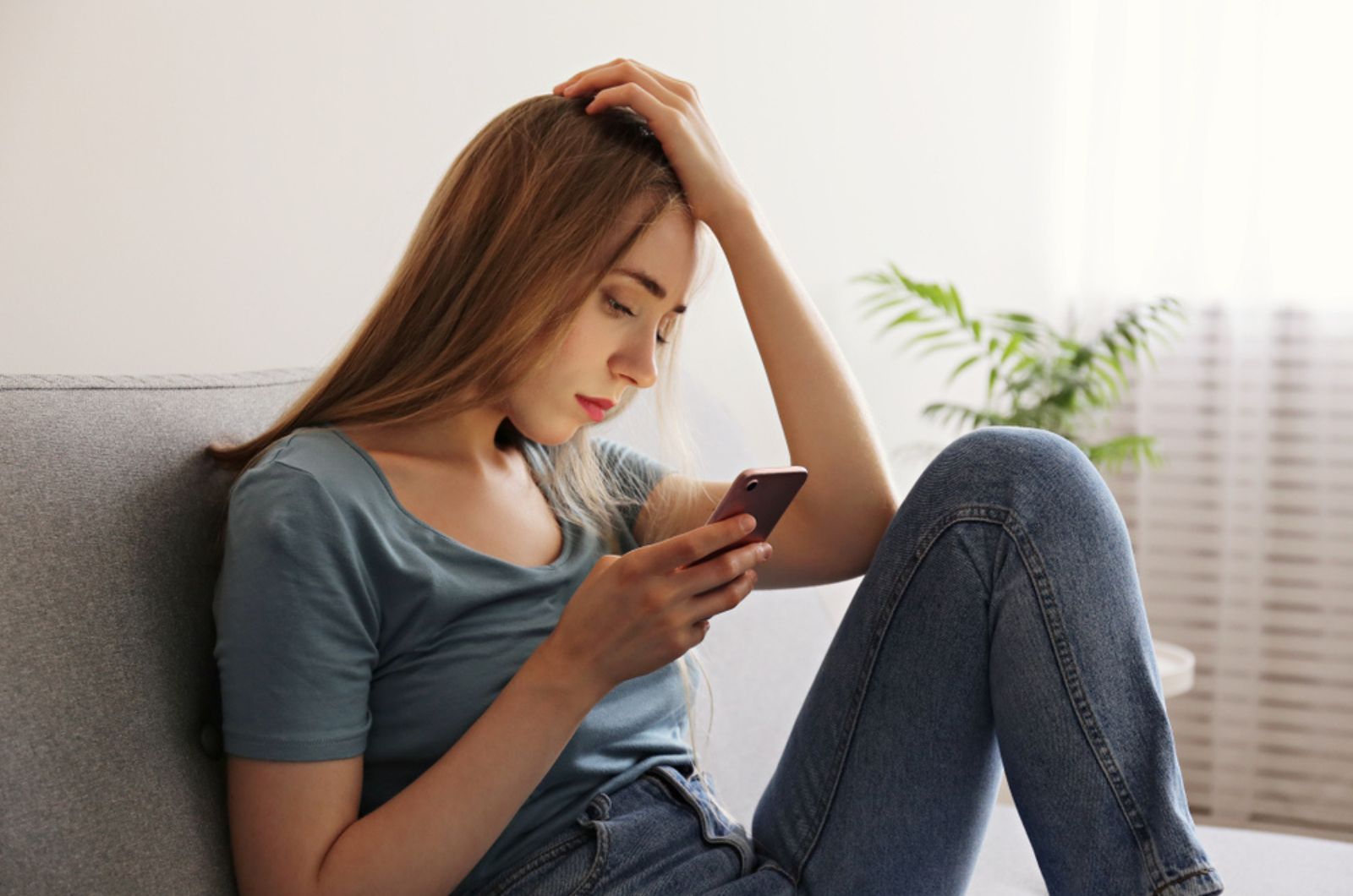 worried woman texting