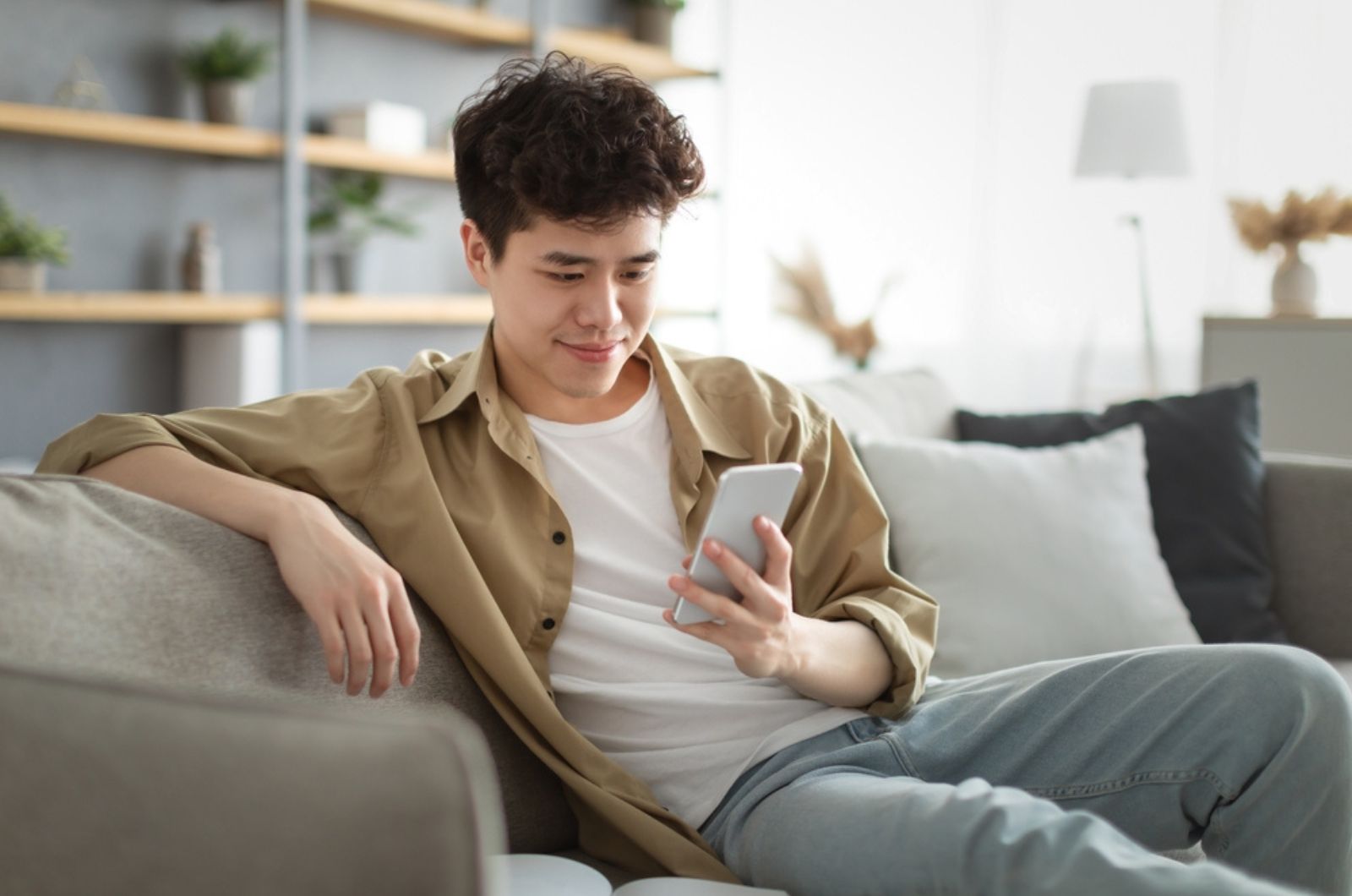 young man looking at phone