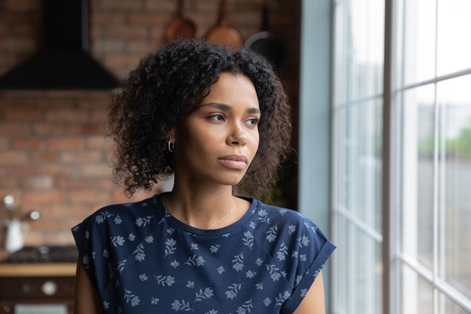 worried woman in thoughts