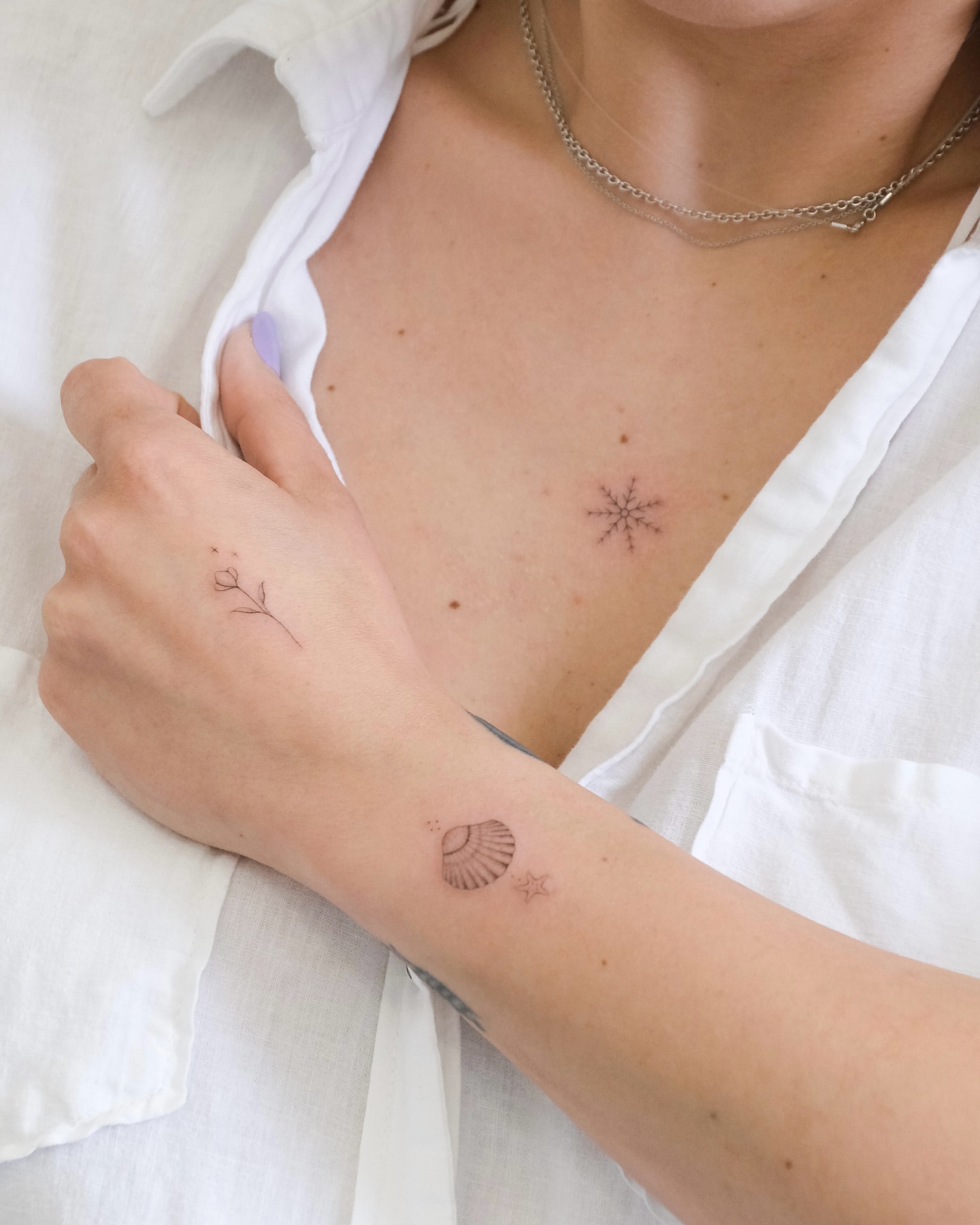piccoli tatuaggi sul braccio