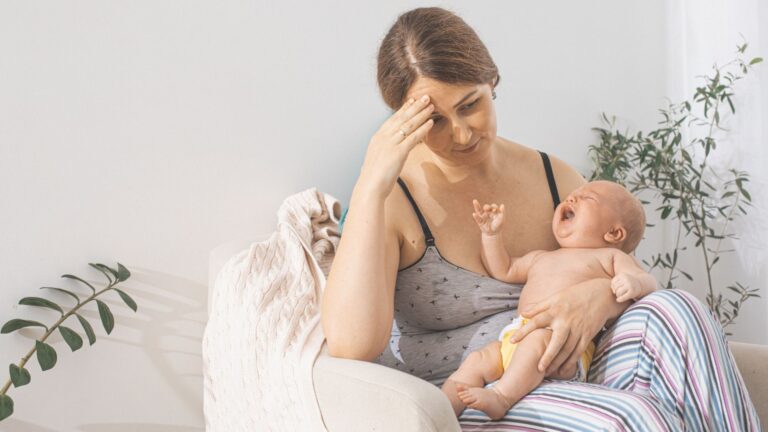 mom holding a baby