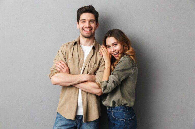 smiling young couple posing