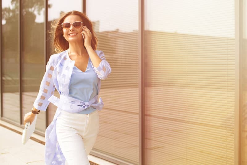 confident woman talking on phone