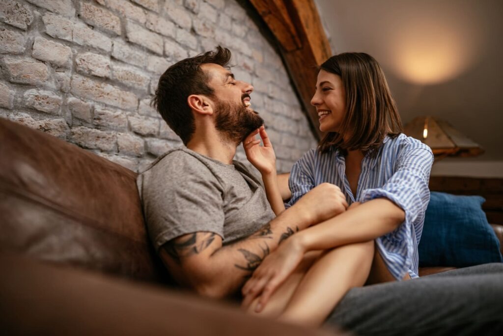 couple smiling and talking