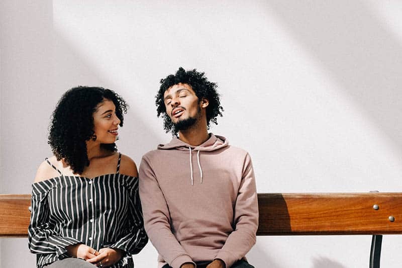 couple talking on the bench