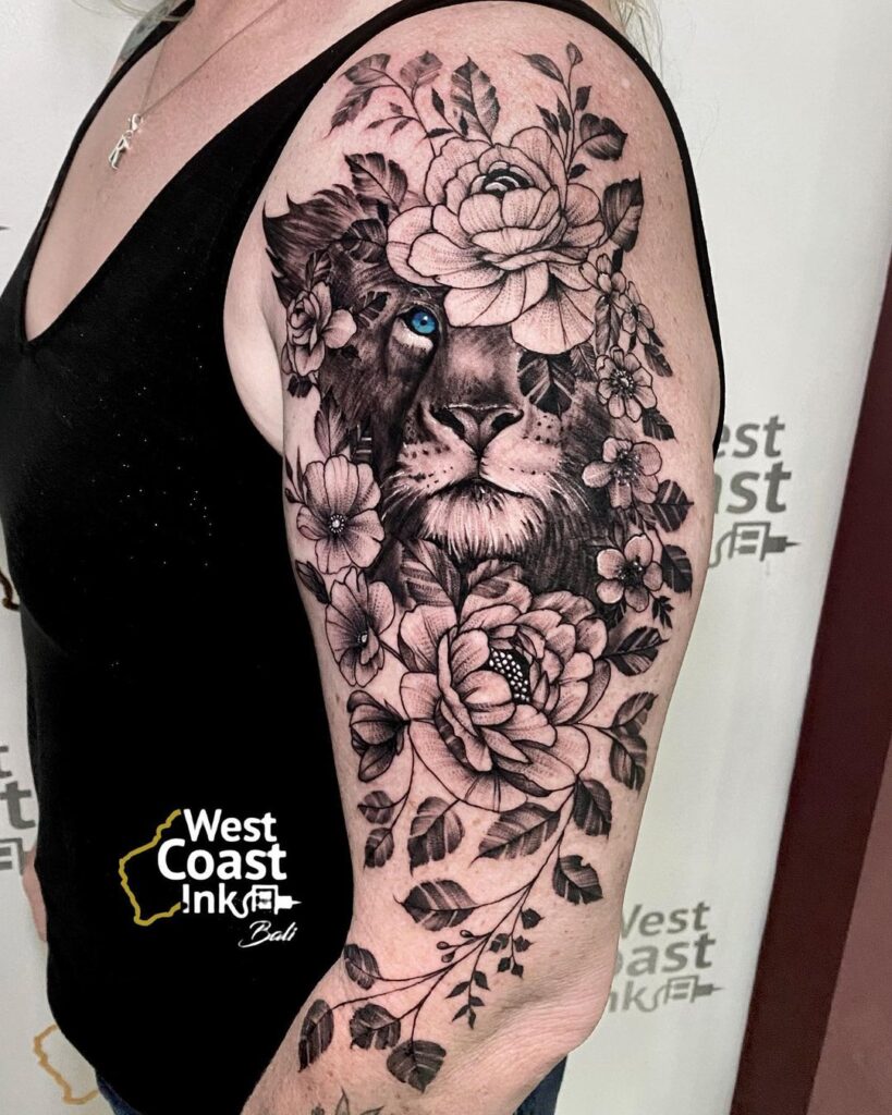 floral magic with lion half sleeve tattoo