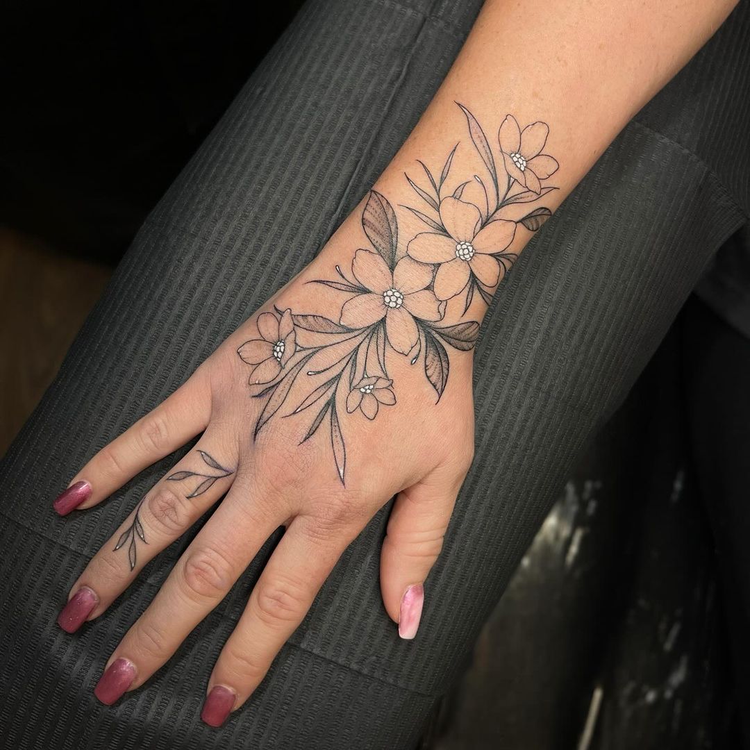 peça floral mão dedo