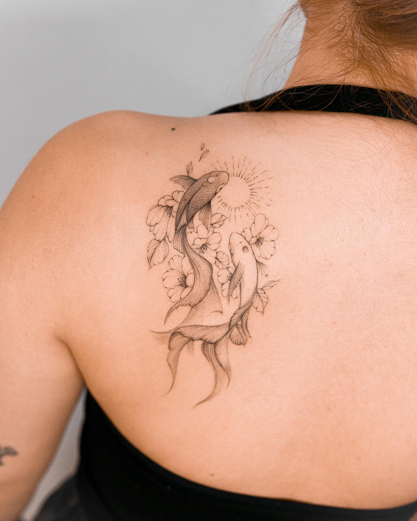 tatuaggio con pesce koi