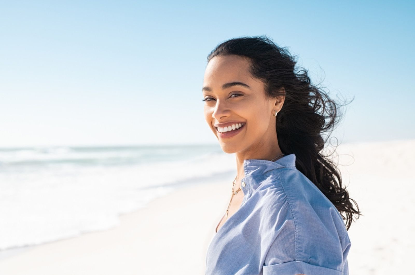 smiling woman on the beach