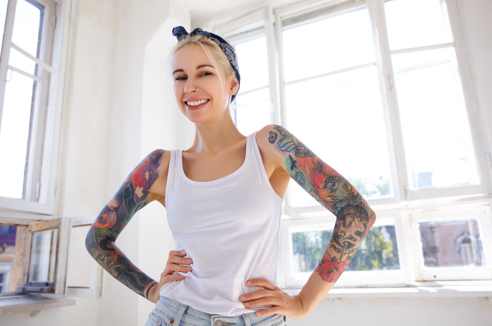 tattooed blonde female