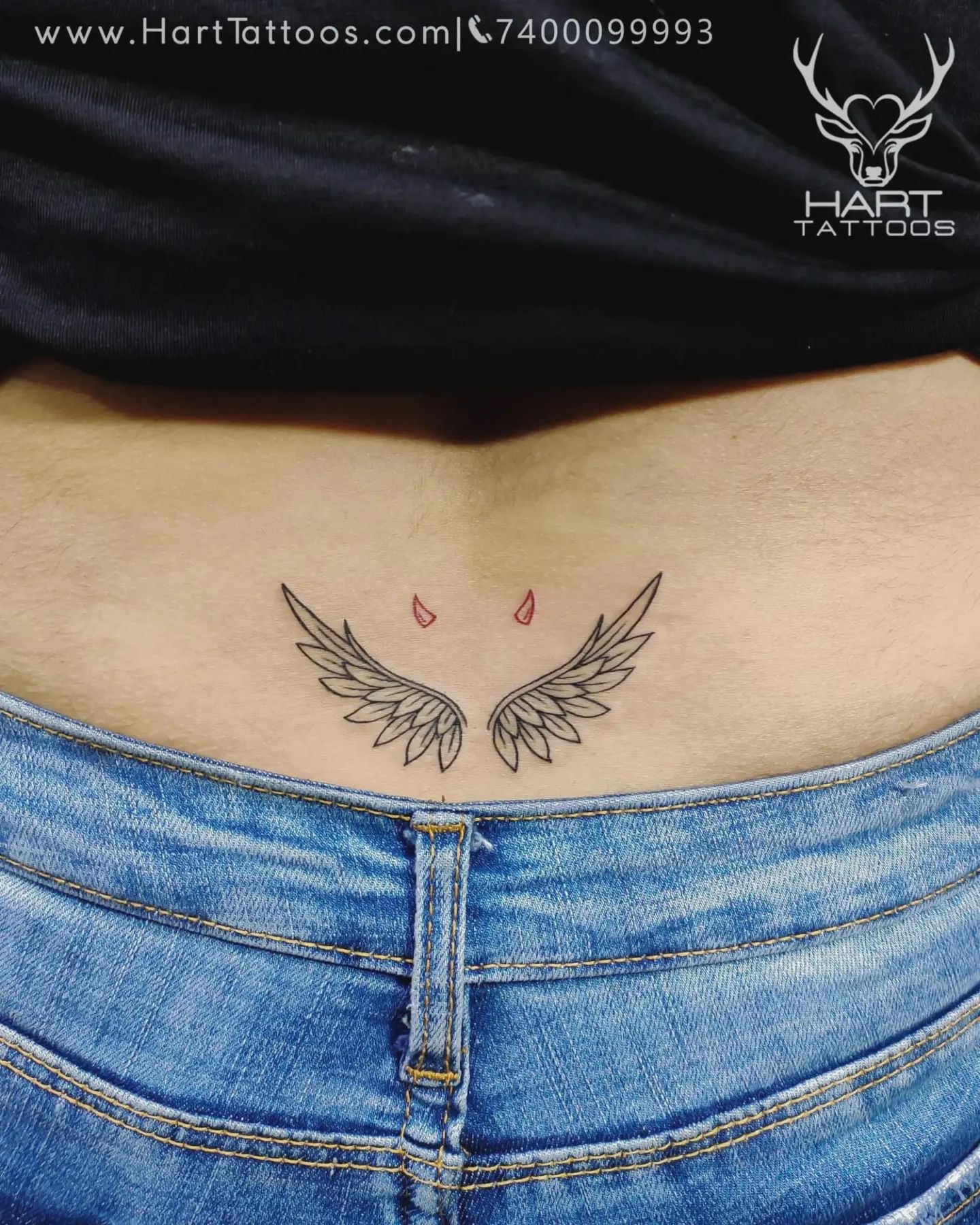 angel wings with devil horns tattoo