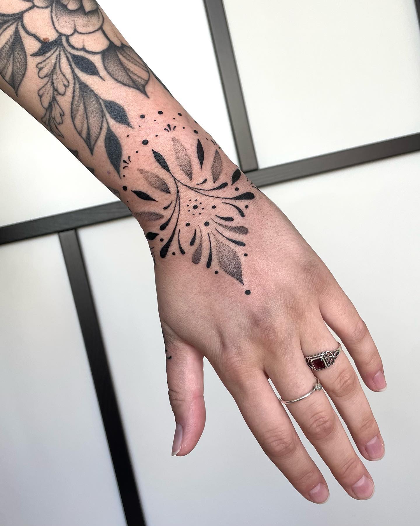 dotwork hand tattoo