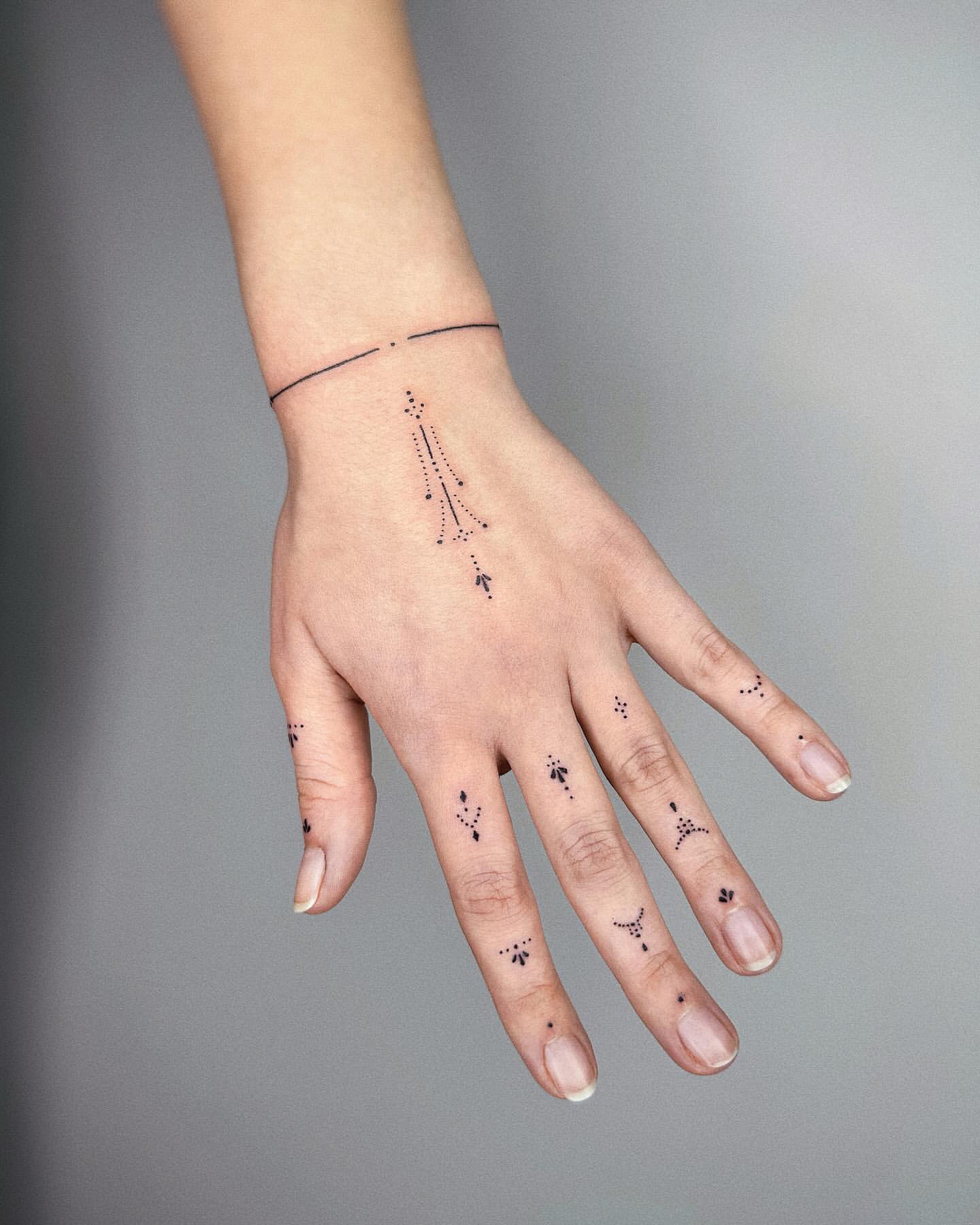 fine line ornamental tattoo