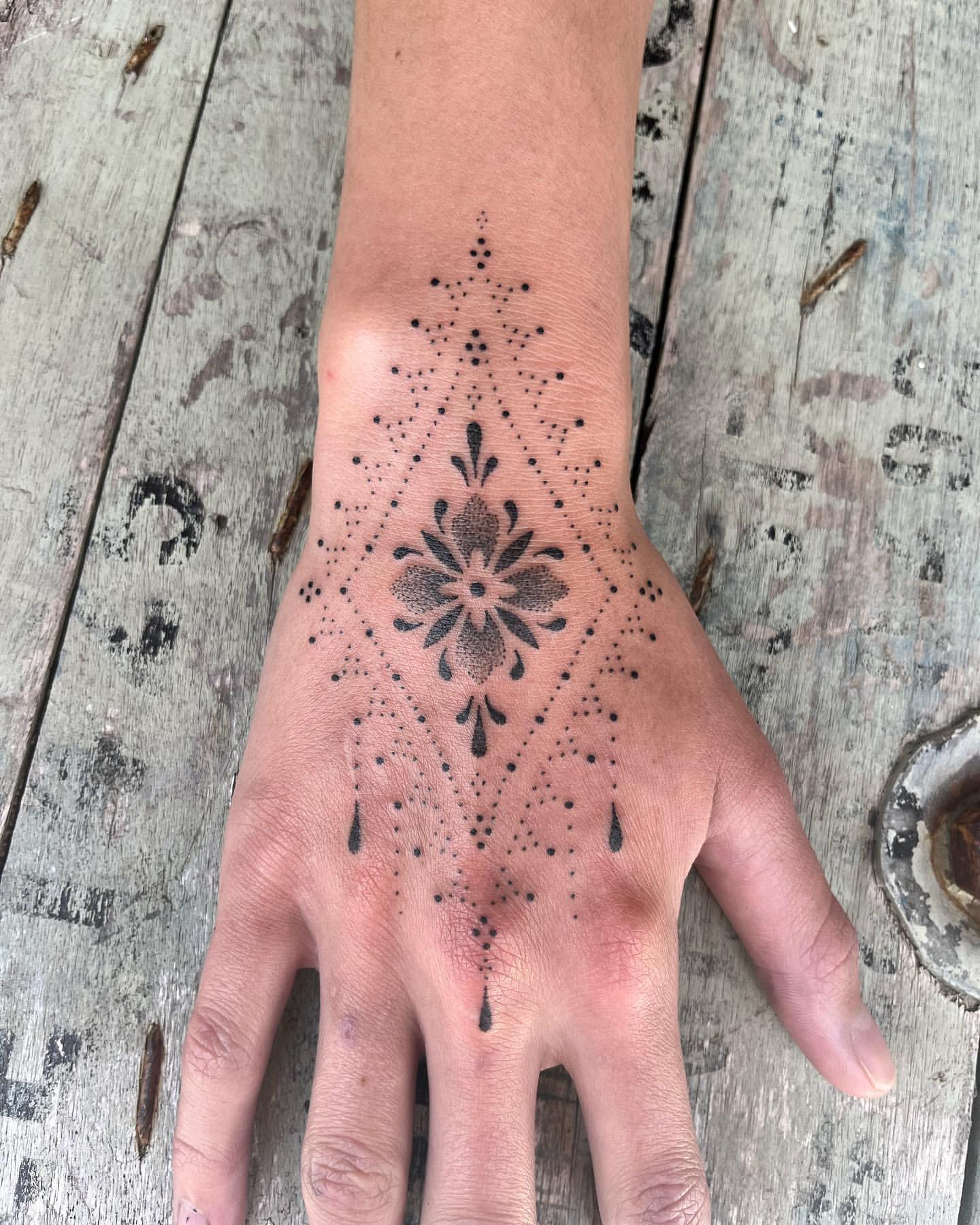 ornamental hand tattoo