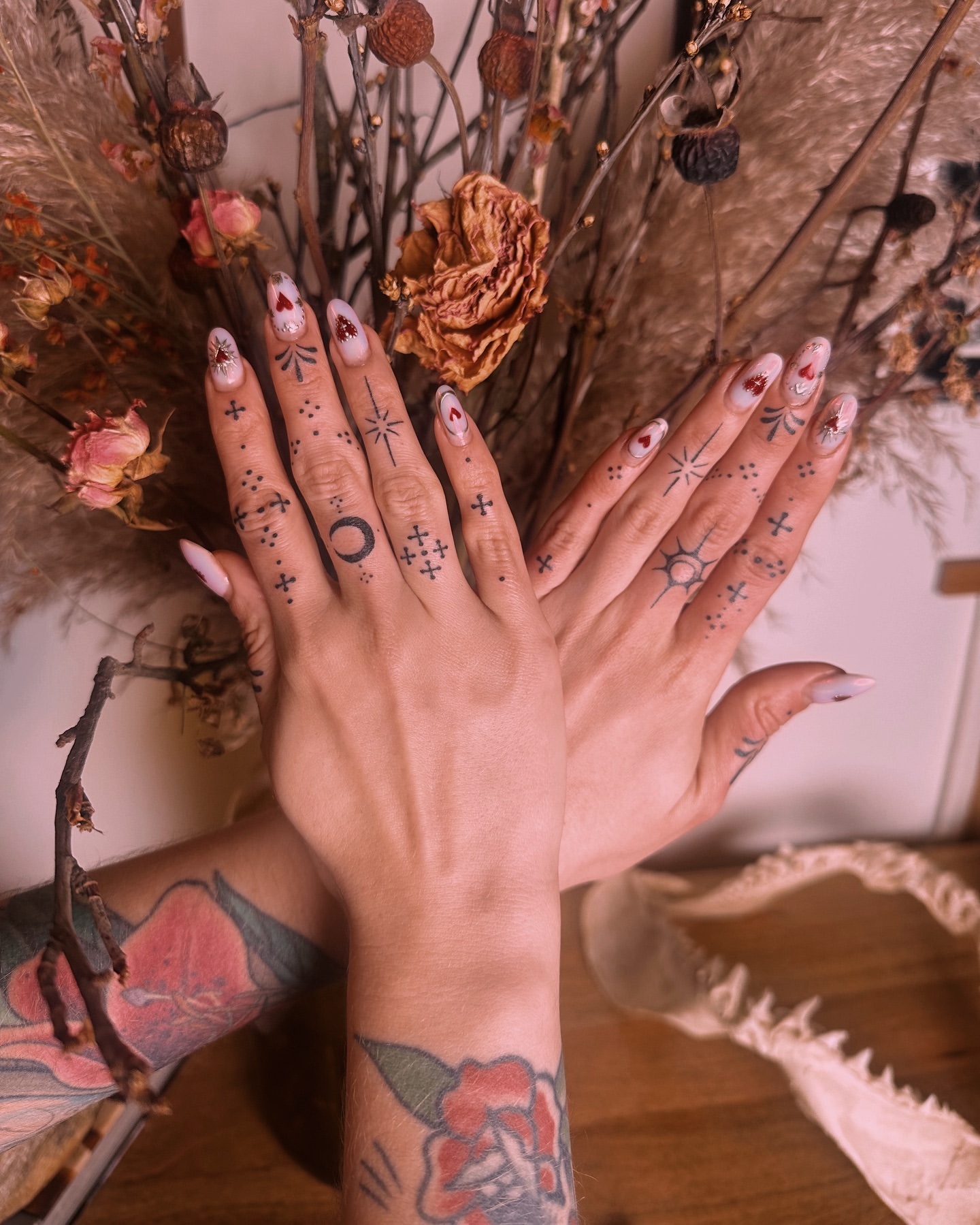 handpoke finger tattoos