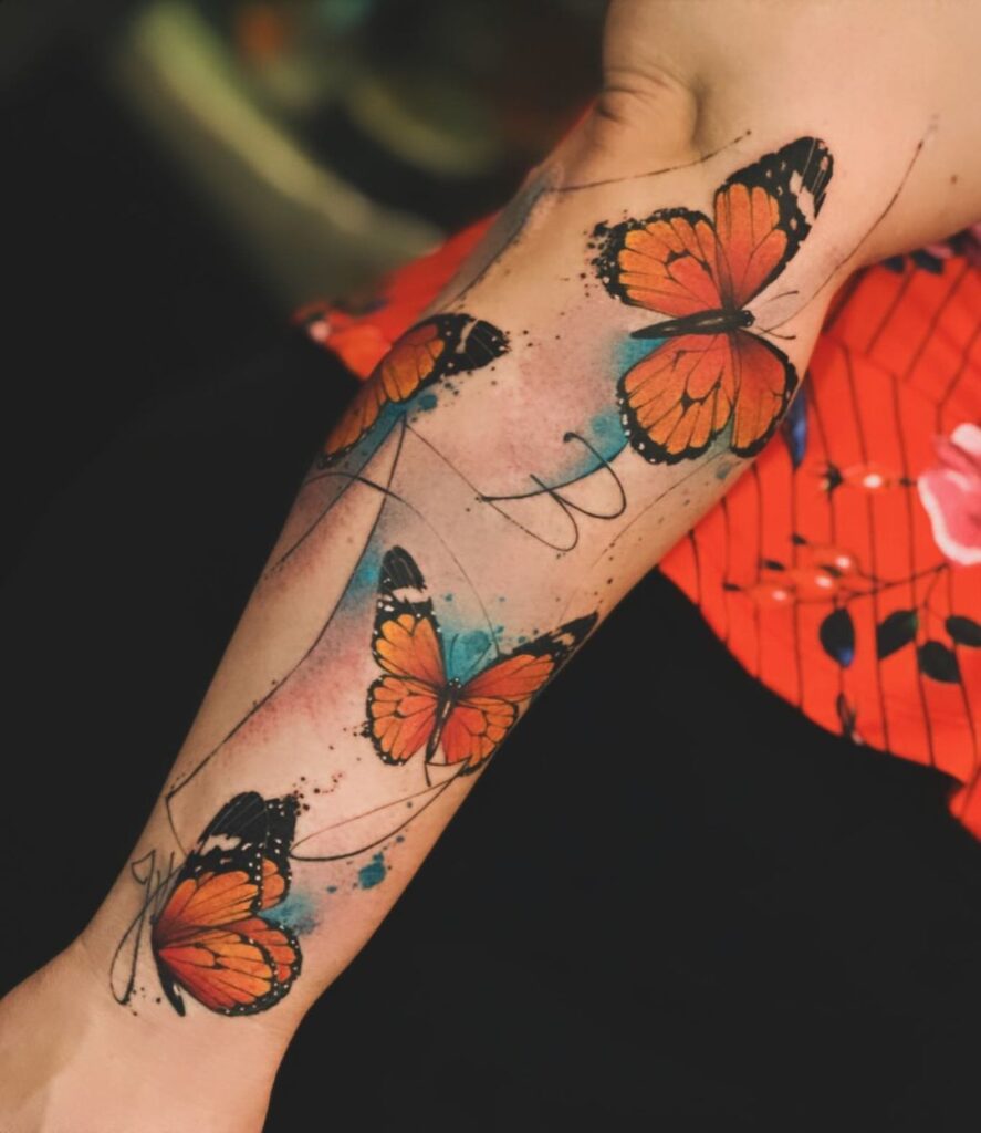 Tatuaje de mariposa en acuarela