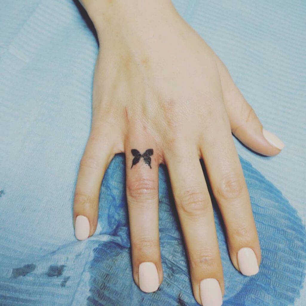 Butterfly Small Finger Tattoo