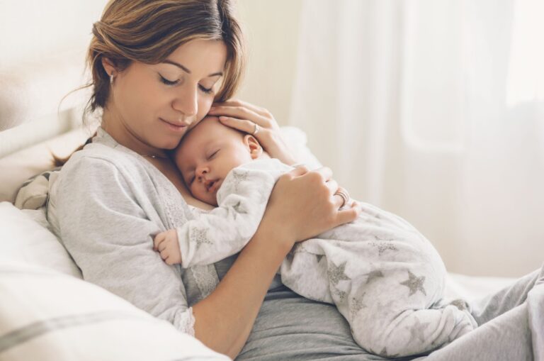 mom holding a baby