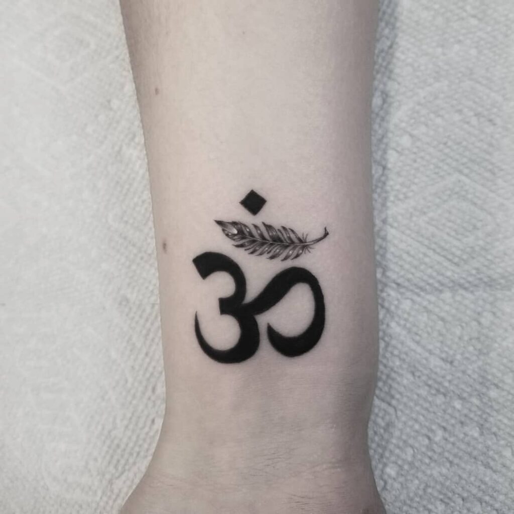 Om Wrist Tattoo