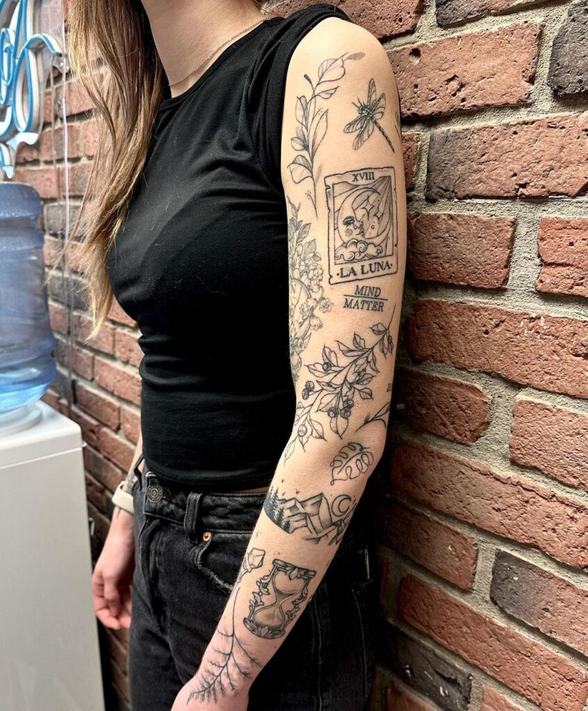 Tatuagem de braço em patchwork