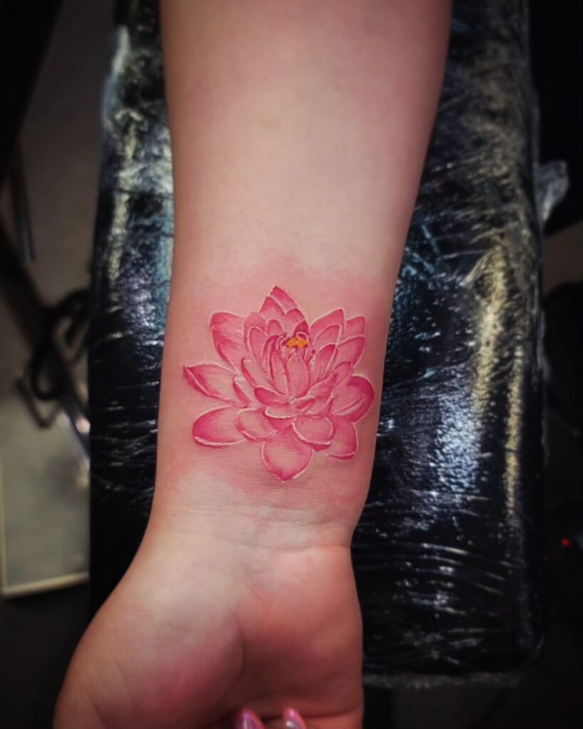 Pink Lotus Flower Wrist Tattoo