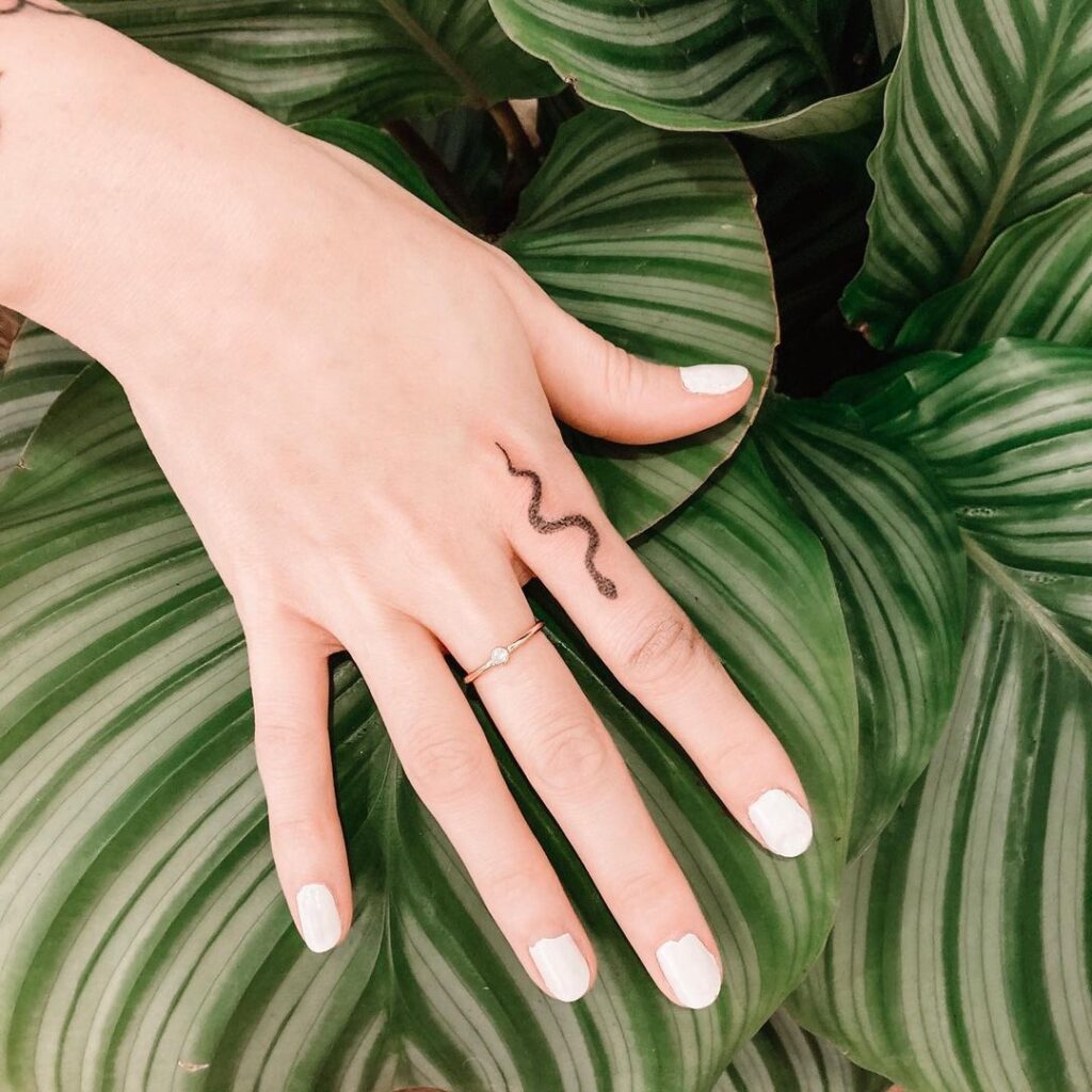 Snake Finger Tattoo