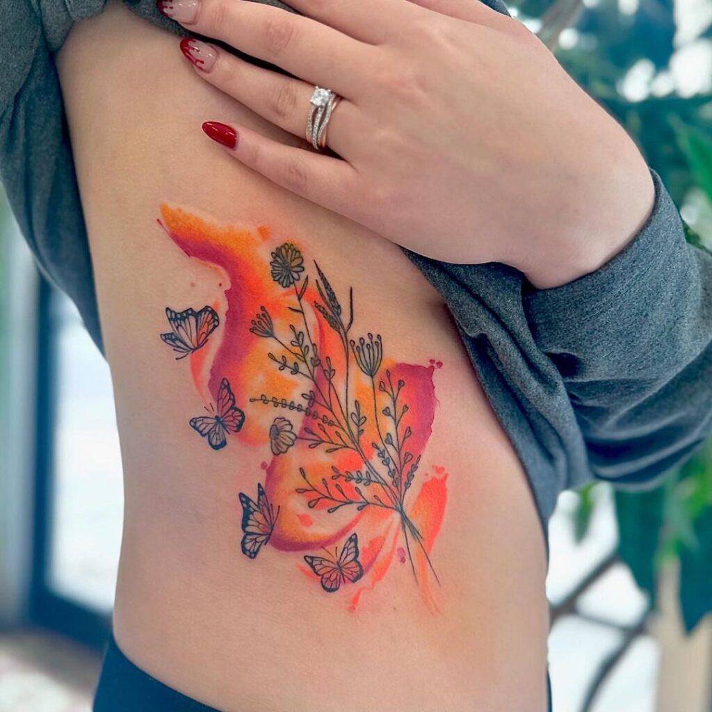 Tatuaje de flores silvestres en acuarela