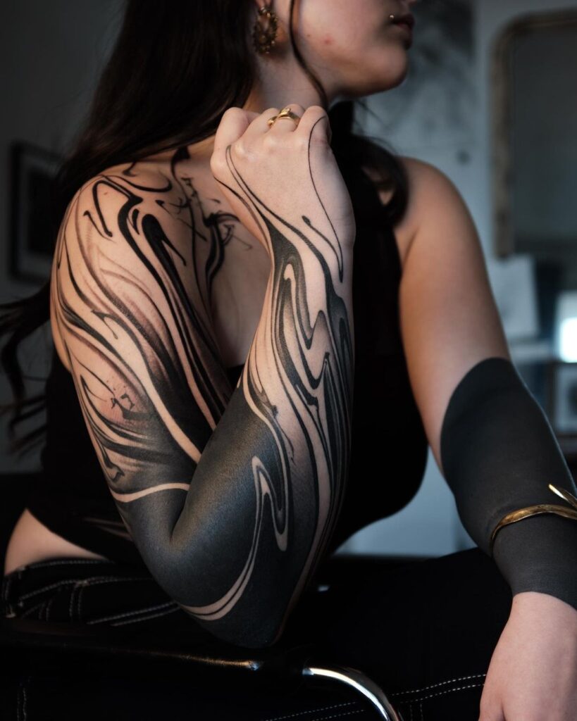 abstract flow full sleeve tattoo