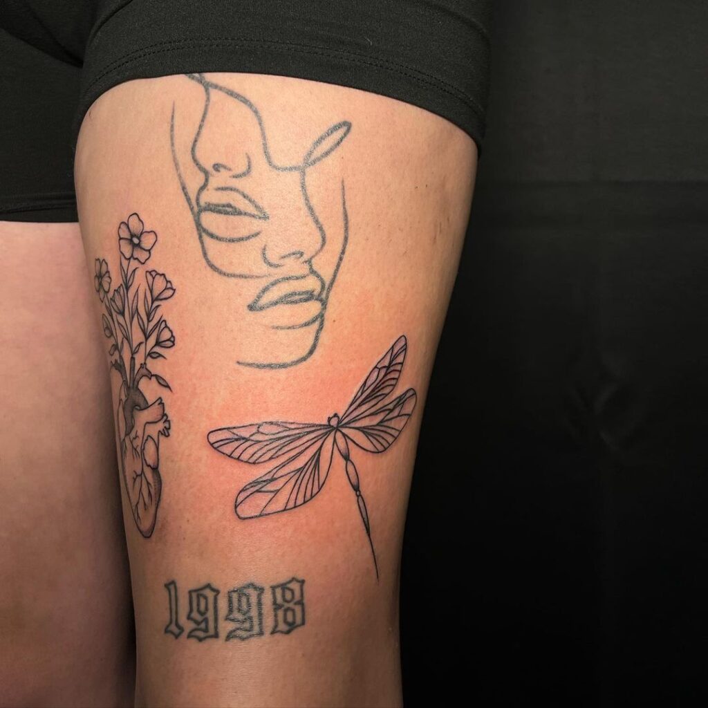 tatuaggio astratto a mezza manica sulla gamba