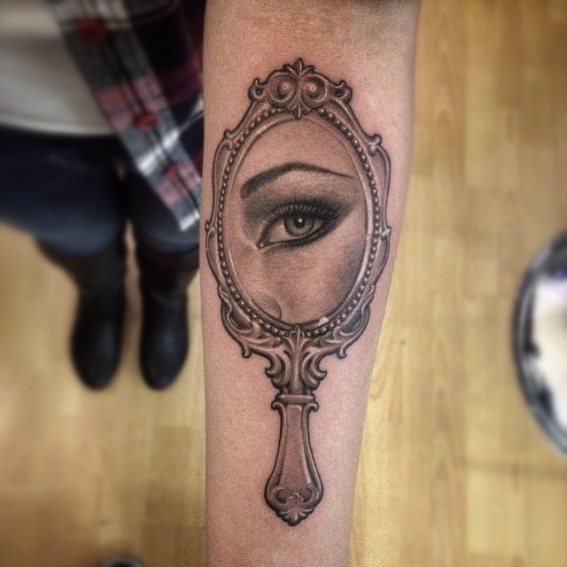 antique mirror and eye tattoo