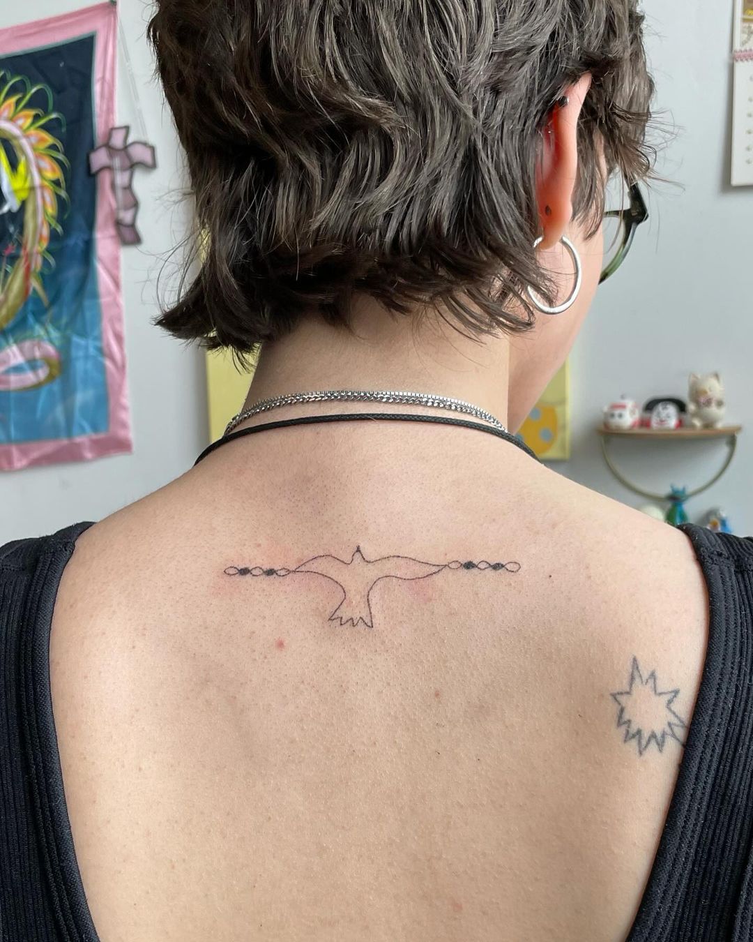 bird back tattoo