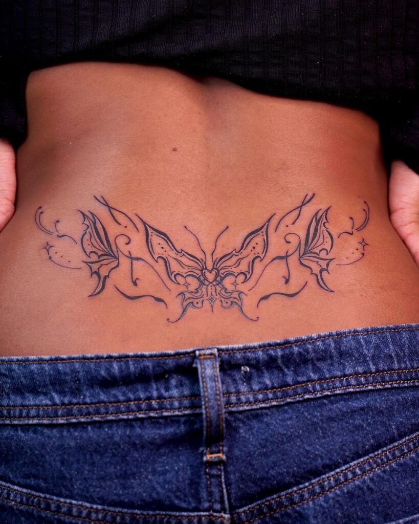 butterfly lower back tattoo