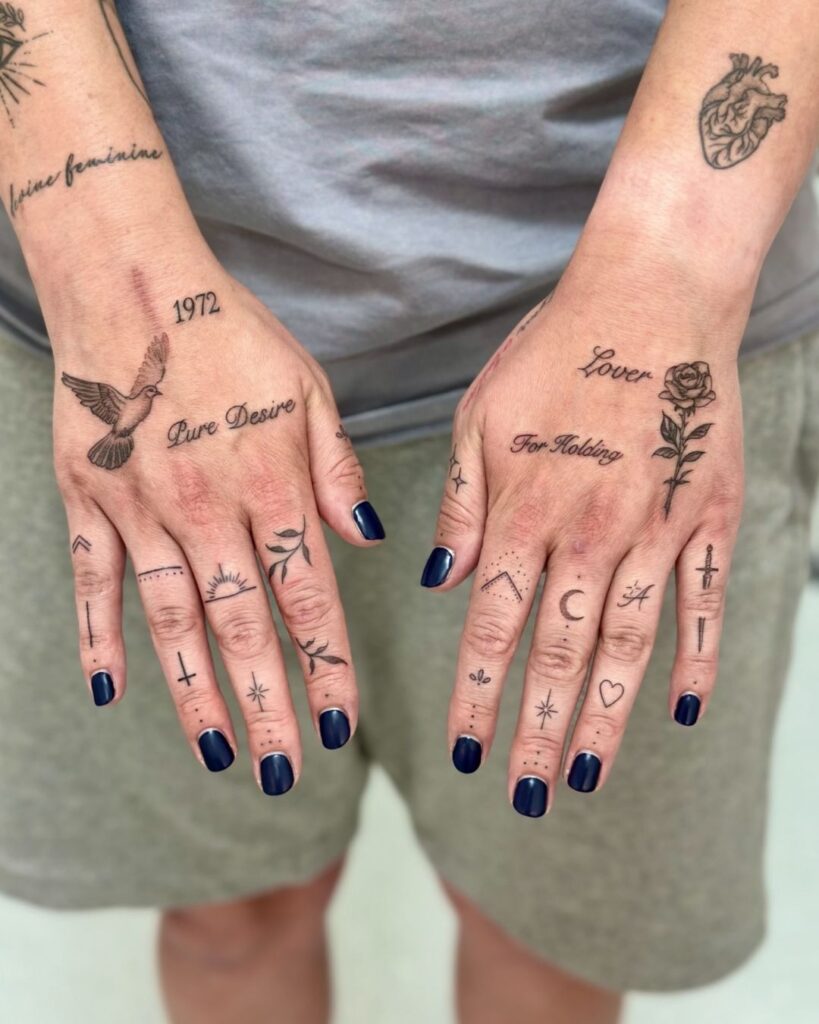 celestial ornamental finger tattoos