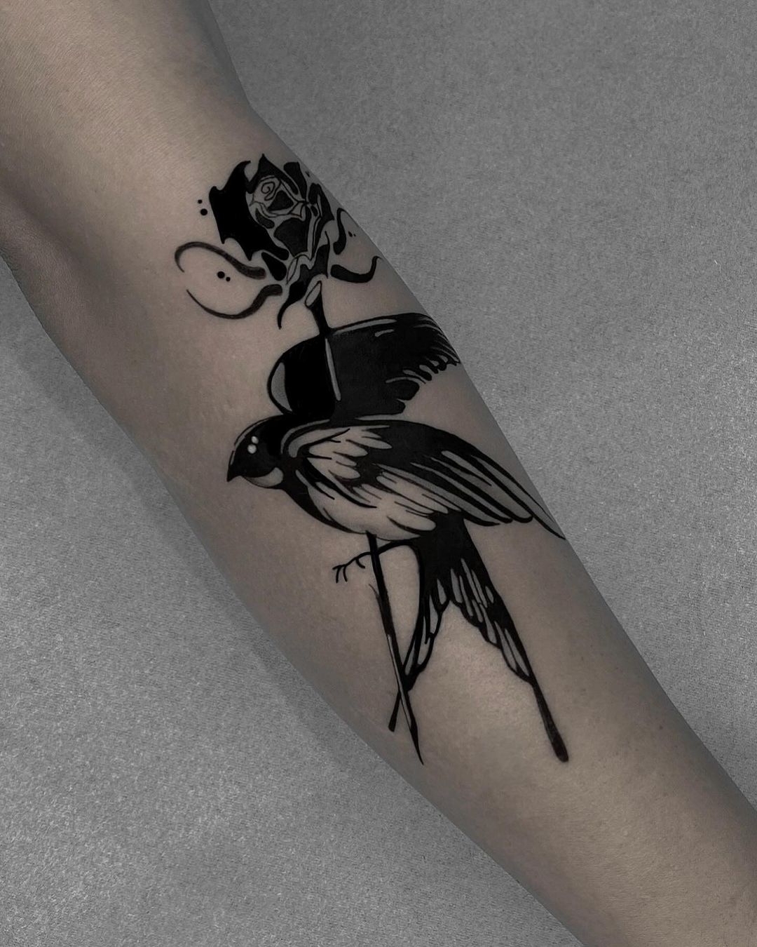 cool blackwork bird tattoo