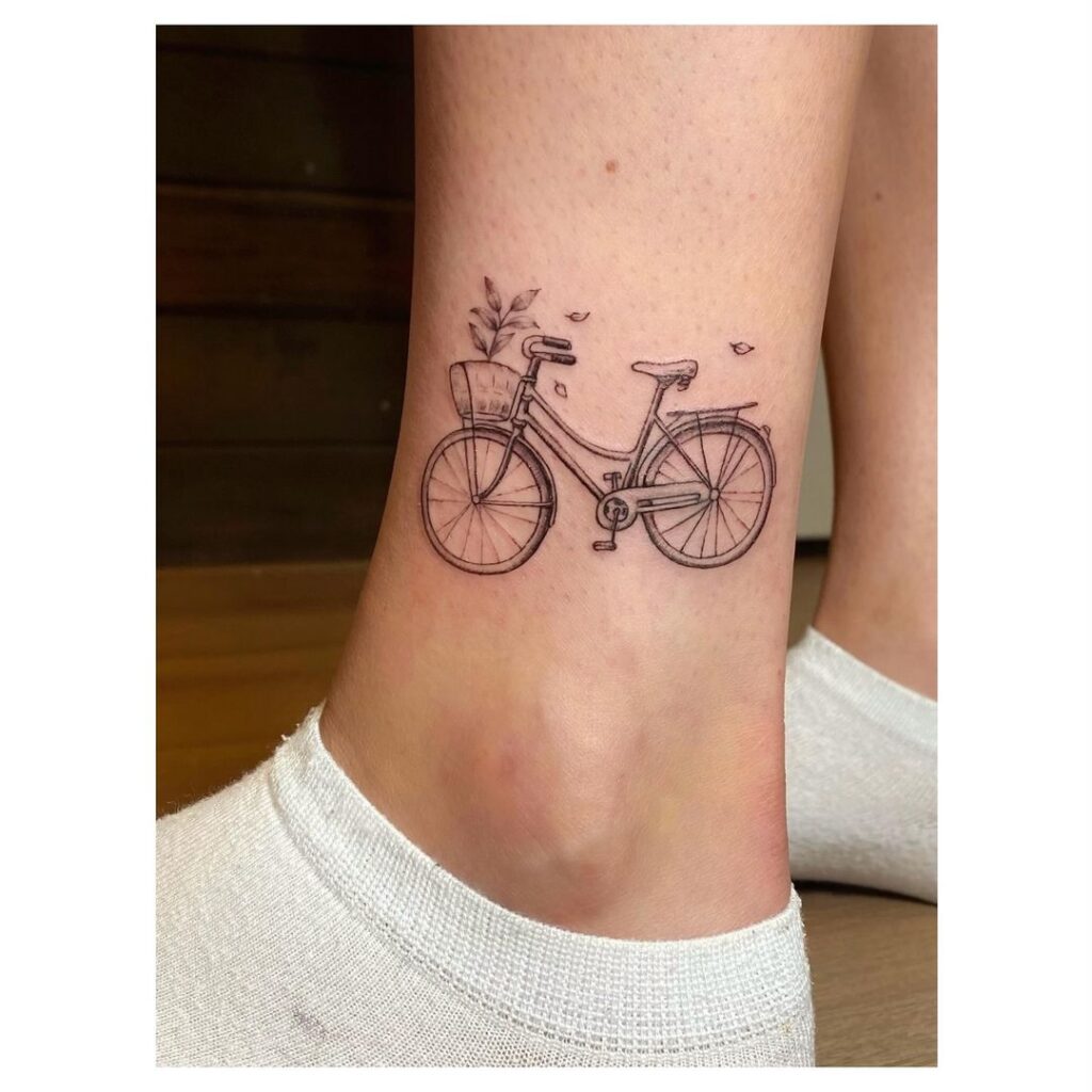 tatuagem de bicicleta com linhas finas