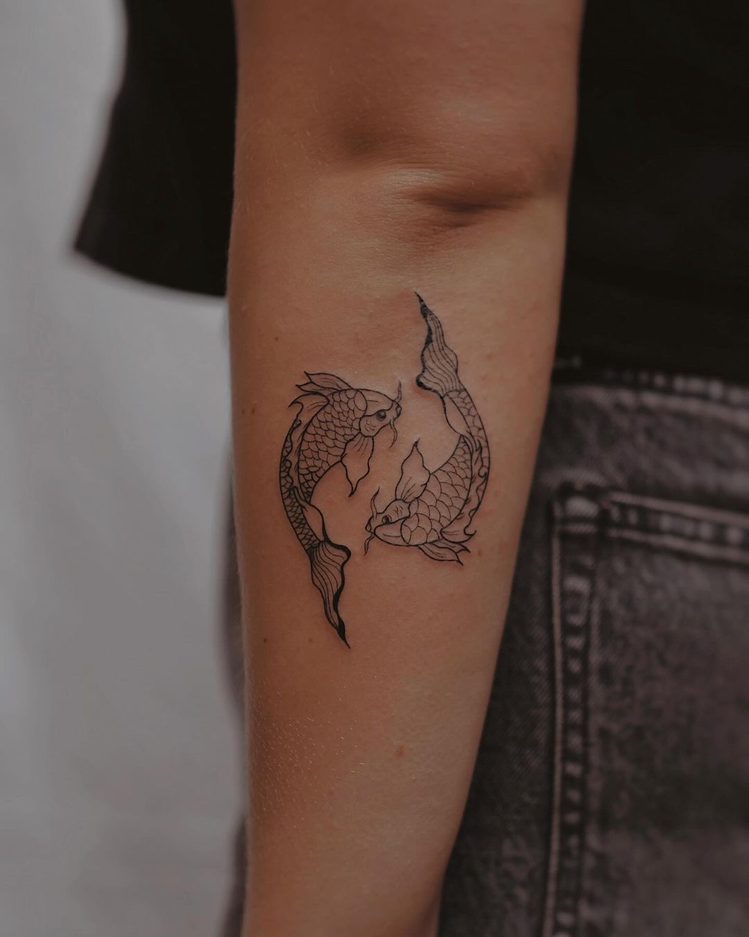 tatuaggio a forma di pesce