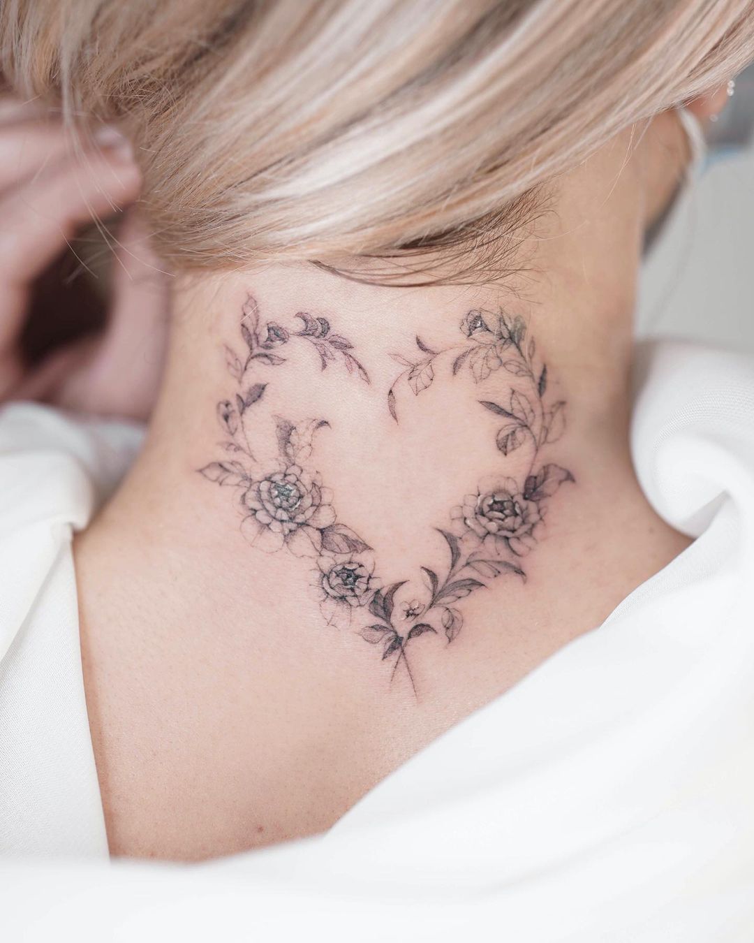 floral heart tattoo