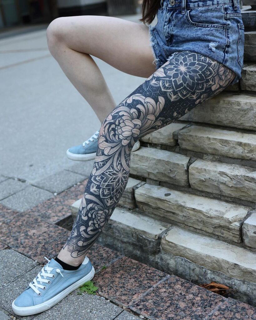 floral ornamental leg sleeve tattoos